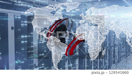 Image of globe and world map over server room Image of globe and world map over server room 129541660