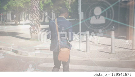 Image of network of connections over african american businessman and clouds 129541675