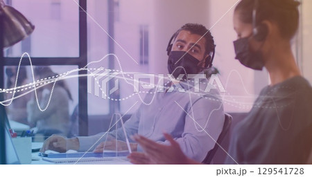 Image of data processing with white lines over diverse business people with face masks Image of data processing with white lines over diverse business people with face masks 129541728