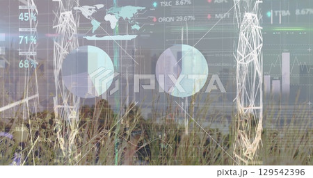 Image of financial graph and data processing over cityscape 129542396