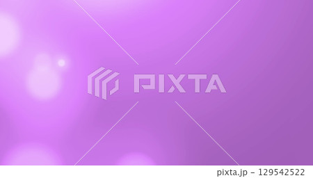 Image of dots of light moving on violet background 129542522