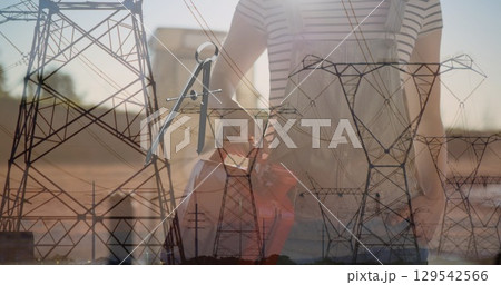 Image of hexagons over business people businessman handshake 129542566