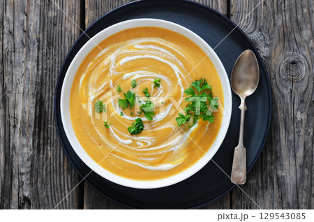 roasted parsnip and carrot soup, top view roasted parsnip and carrot soup, top view 129543085