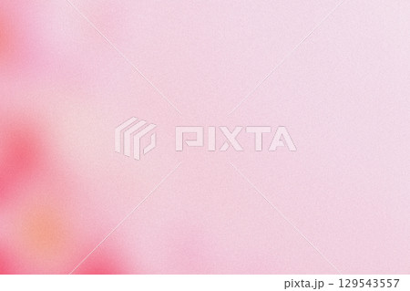 ピンクの淡い粒子のグラデーション背景ノイズ 129543557