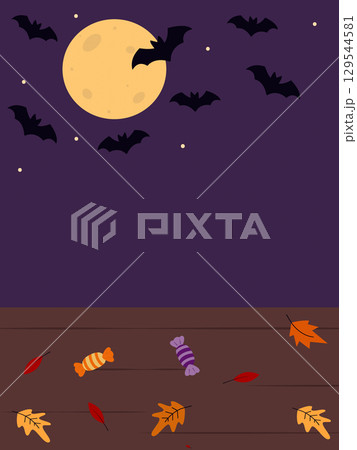 Halloween Backdrop with Autumn leaves and Candies on wooden Full moon and Bats on purple Copy space 129544581