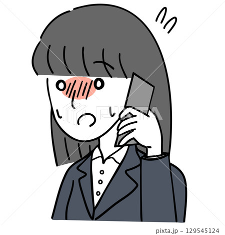 緊張しながら電話するスーツ姿の女性 緊張しながら電話するスーツ姿の女性 129545124