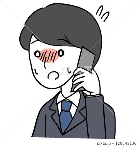 緊張しながら電話するスーツ(学生服)の男性 緊張しながら電話するスーツ(学生服)の男性 129545130