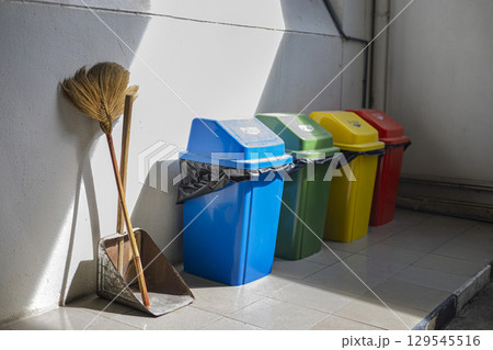 Colorful Trash Cans For Sorting Trash showcasing recycling and eco-friendly practicesperfect for environmental campaigns, sustainability projects, or educational content. 129545516