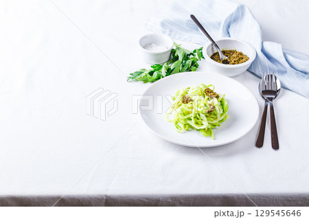 Healthy Zucchini Noddles with pesto 129545646