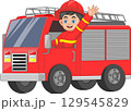 firefighter boy and riding fire truck and waving 129545829