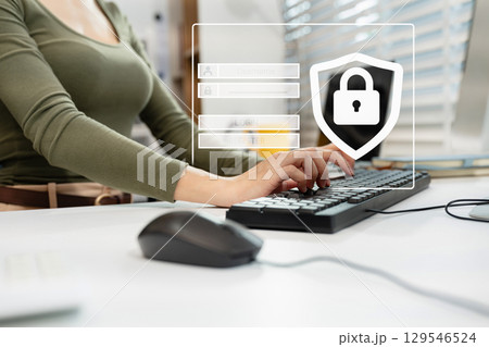 woman typing login and password in the concept of cyber security, information security, data protection, and encryption for secure access to user's personal information. woman typing login and password in the concept of cyber security, information security, data protection, and encryption for secure access to user's personal information. 129546524