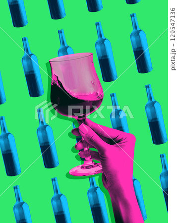 Bright collage. Pink hand holding wine glass over bright bottle pattern pop art style Bright collage. Pink hand holding wine glass over bright bottle pattern pop art style 129547136