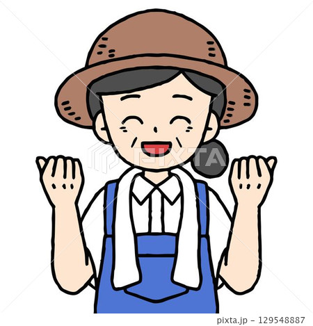 農家の女性がガッツポーズをしている 129548887