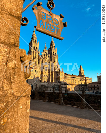 Tower of the Cathedral of Santiago de Compostela seen from a street in the downtown 129550842
