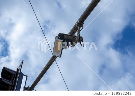 CCTV camera mounted on a street pole for urban traffic monitoring and enhancing public safety within modern smart city infrastructure CCTV camera mounted on a street pole for urban traffic monitoring and enhancing public safety within modern smart city infrastructure 129552242
