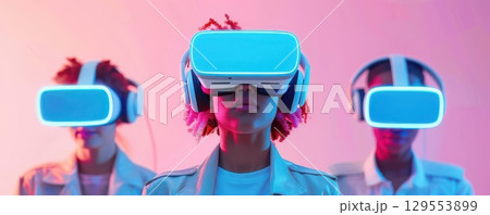 Three people wearing VR headsets, immersed in virtual reality. 129553899