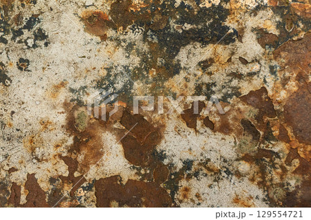 Rustic corroded metal texture with brown and orange patina Rustic corroded metal texture with brown and orange patina 129554721