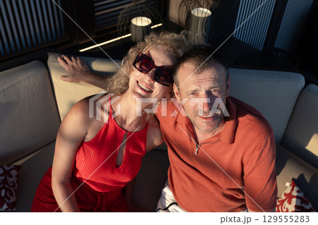 Married couple on cruise ship. Attractive couple on deck with cruise ship. High quality photo Married couple on cruise ship. Attractive couple on deck with cruise ship. High quality photo 129555283