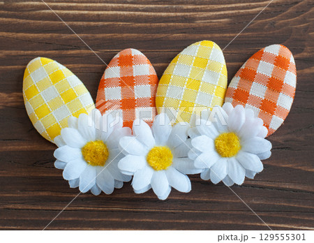 Artificial Easter eggs with flower Artificial Easter eggs with flower 129555301