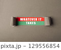 Whatever it takes is written on a torn piece of paper 129556854