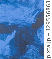Blue and black painting with brush strokes 129556863