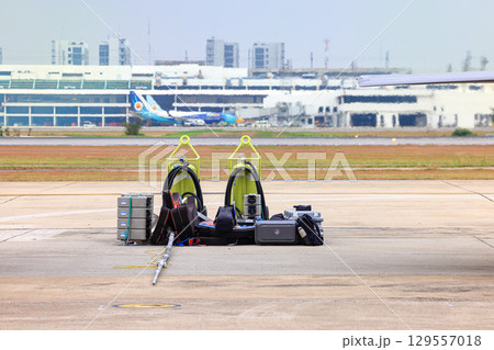 Equipment for supporting the operations of fighter aircraft piled up near the aircraft parking area. 129557018
