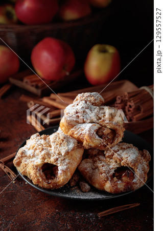 Homemade mini apple strudels with apples and cinnamon. 129557527