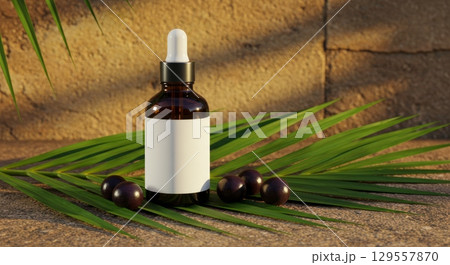 Natural skincare serum bottle on palm leaves with tropical background for beauty and wellness design 129557870