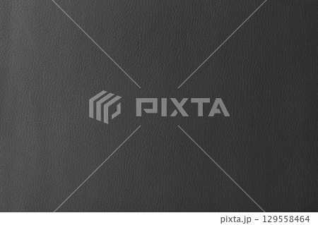 Texture of genuine leather, artificial leatherette black background 129558464