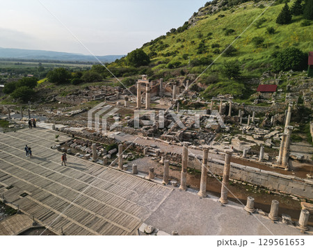 Colonnades and marble road beside the Odeon theatre in Ephesus, Turkey 129561653