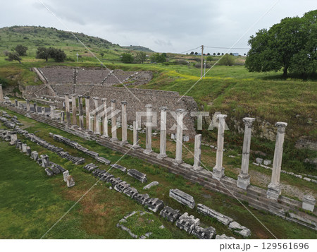 Aerial view of ancient columns and amphitheater ruins in Pergamon Turkey Aerial view of ancient columns and amphitheater ruins in Pergamon Turkey 129561696