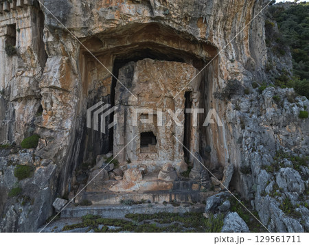 Detail of rock hewn chamber at high cliff necropolis by Marmaris, Turkey Detail of rock hewn chamber at high cliff necropolis by Marmaris, Turkey 129561711