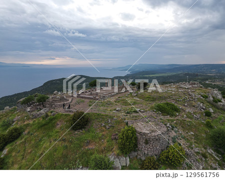 Aerial view of ancient Temple of Athena ruins in Assos Turkey on a hilltop Aerial view of ancient Temple of Athena ruins in Assos Turkey on a hilltop 129561756