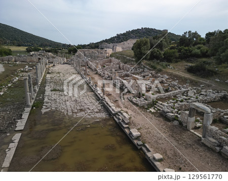 Aerial view of Patara colonnaded street and harbor canal in Antalya, Turkiye Aerial view of Patara colonnaded street and harbor canal in Antalya, Turkiye 129561770