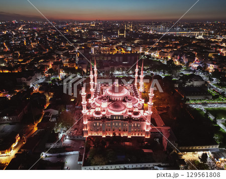 Aerial view of majestic Suleymaniye Mosque illuminated at dusk in Istanbul 129561808