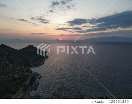 Ancient Knidos lighthouse on rugged peninsula at sunset in Turkey 129561829