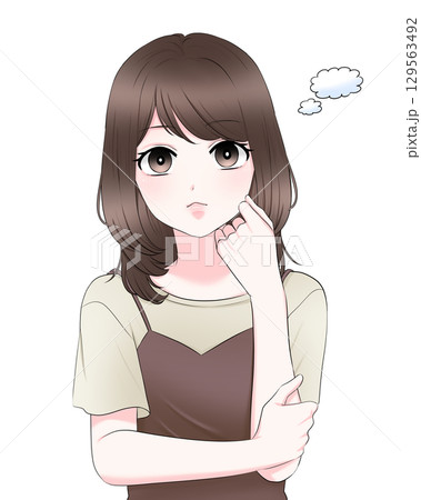 頬に手を添えて考える女性上半身 129563492