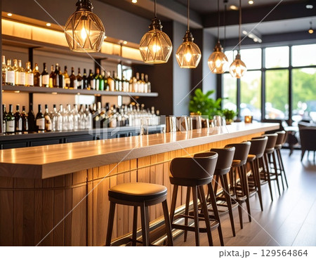 木製カウンターとガラス照明が映えるおしゃれなバー2　AI生成画像 129564864