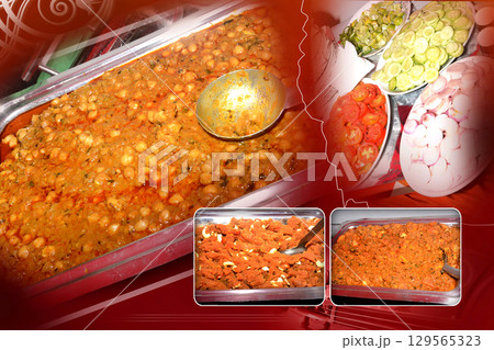 Indian Buffet Spread with Chickpea Curry, Fresh Salads, and Desserts 129565323