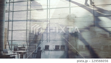 Image of timelapse with walking people over airport 129566056