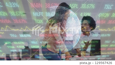 Image of financial data and graphs over diverse businesspeople in office Image of financial data and graphs over diverse businesspeople in office 129567426