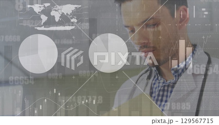 Image of data processing over caucasian male doctor 129567715