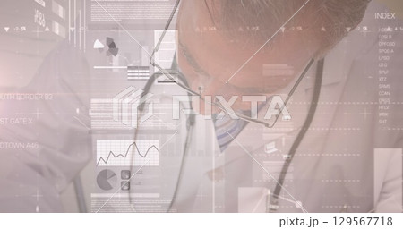 Image of data processing over caucasian male doctor 129567718