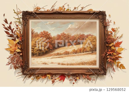 紅葉と木の枝で飾られた、クラシックな額縁と冬の訪れを感じさせる秋の丘の絵画 129568052