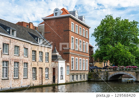 Bruges Belgium Canal View Historic Architecture and Waterway in Picturesque Brugge, Belgium Bruges Belgium Canal View Historic Architecture and Waterway in Picturesque Brugge, Belgium 129568420