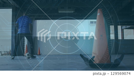 Image of scope scanning with data processing over african american man playing football at gym Image of scope scanning with data processing over african american man playing football at gym 129569074