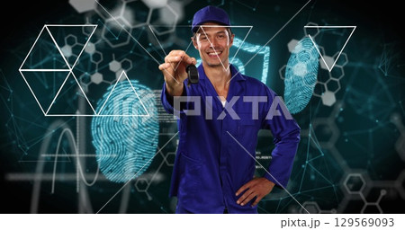 Image of shapes and data processing over caucasian man holding keys 129569093