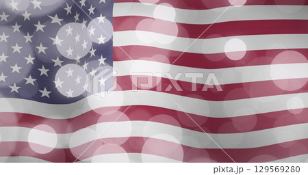 Image of light spots over flag of usa Image of light spots over flag of usa 129569280