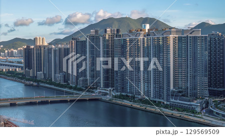 Aug 10 2025 Kai Tak Waterfront and Urban Skyline in Hong Kong 129569509