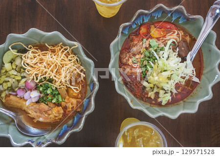 Two bowls of colorful, appetizing food. Two bowls of colorful, appetizing food. 129571528